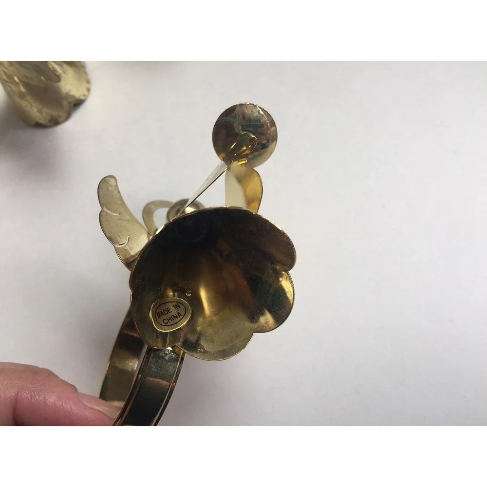 Set of 8 vintage napkin rings trumpet singing drums and candle